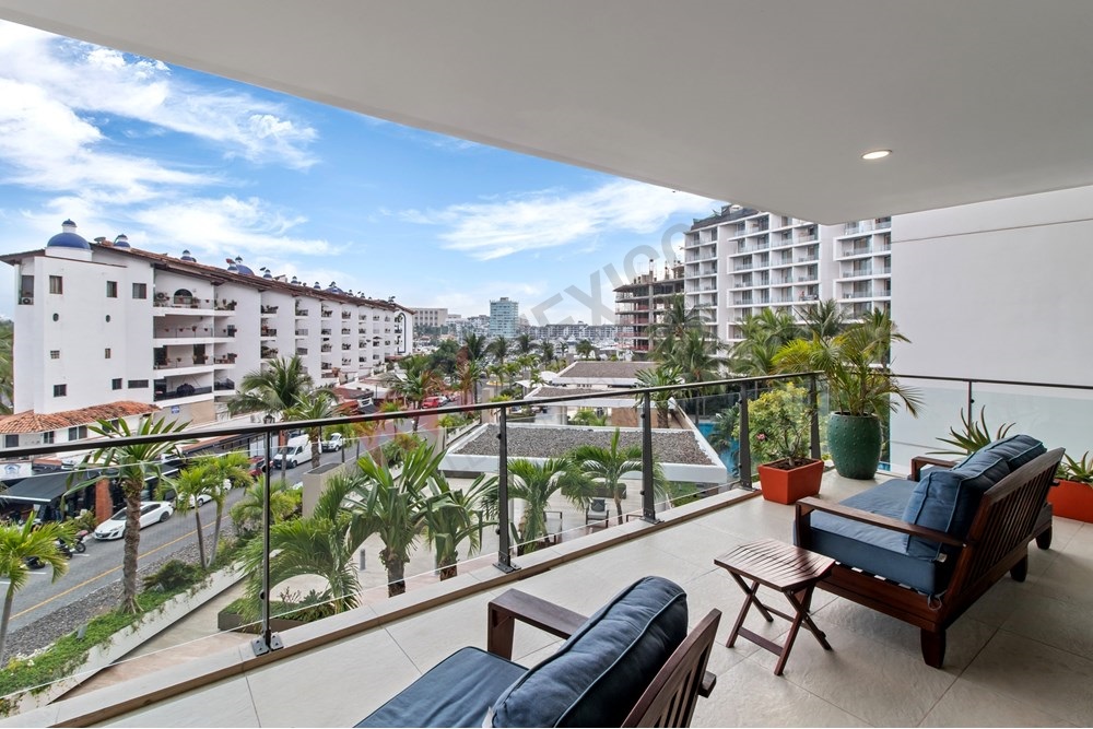 Main view of furnished 2-bedroom condo at Nima Bay, Marina Vallarta with balcony and modern design