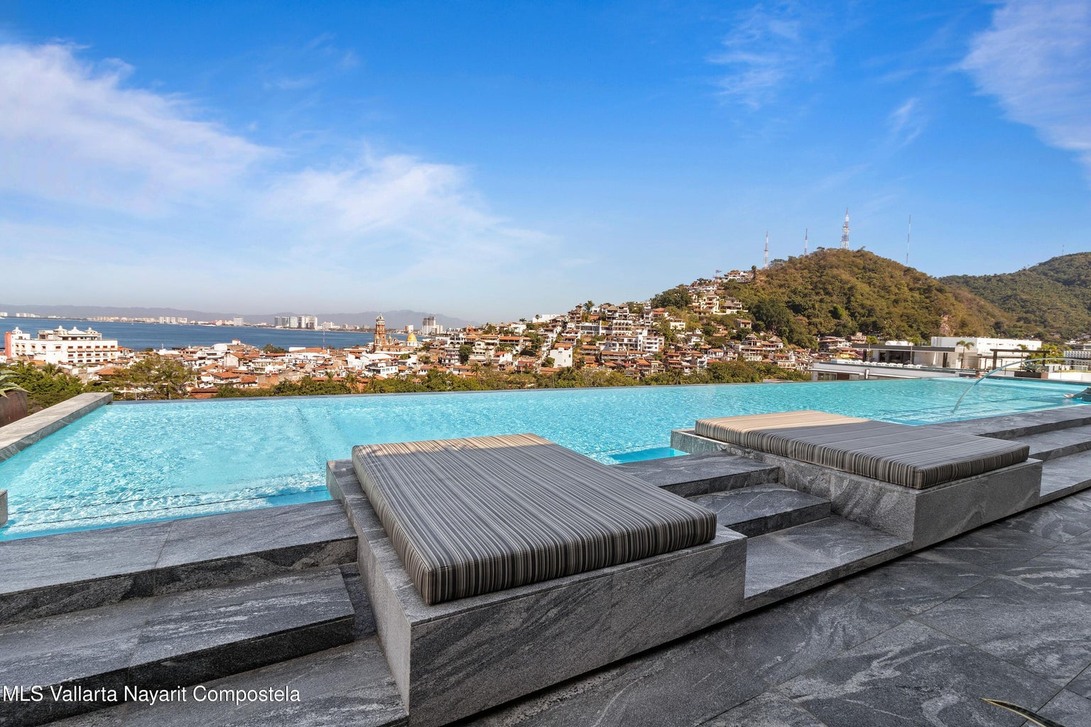 Modern furnished studio condo in Zona Romántica Puerto Vallarta with rooftop pool and ocean views